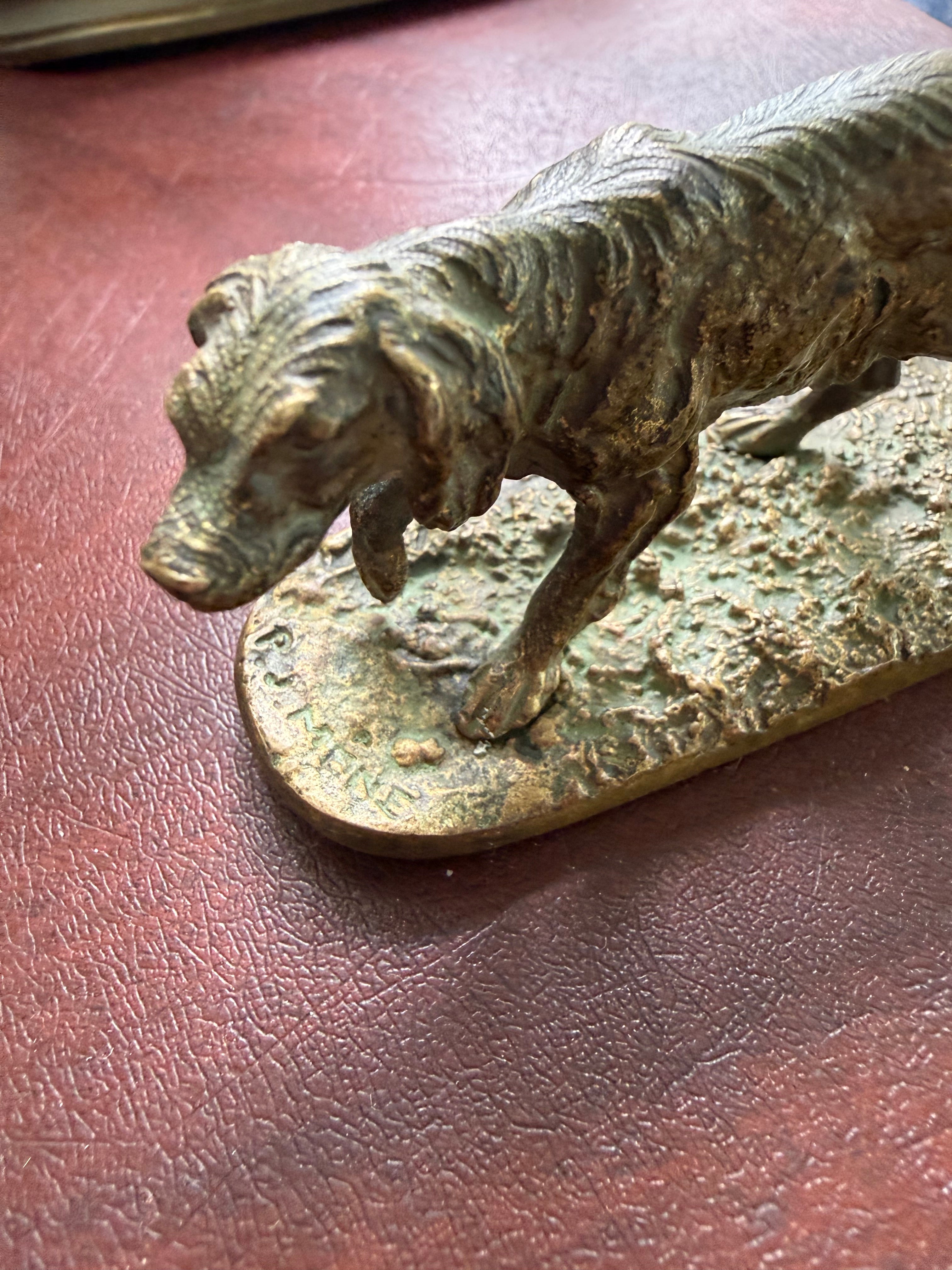 Cast P.J. Mêne signature detail on antique French bronze setter base, 19th century animalier mark