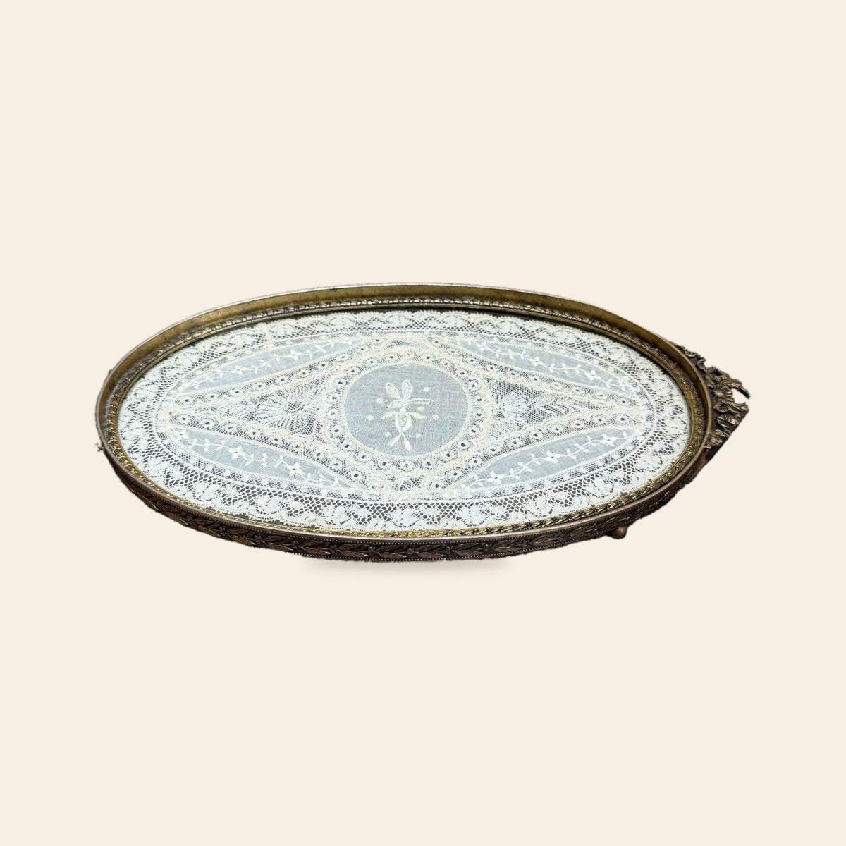 Antique ormolu vanity tray with lace under glass